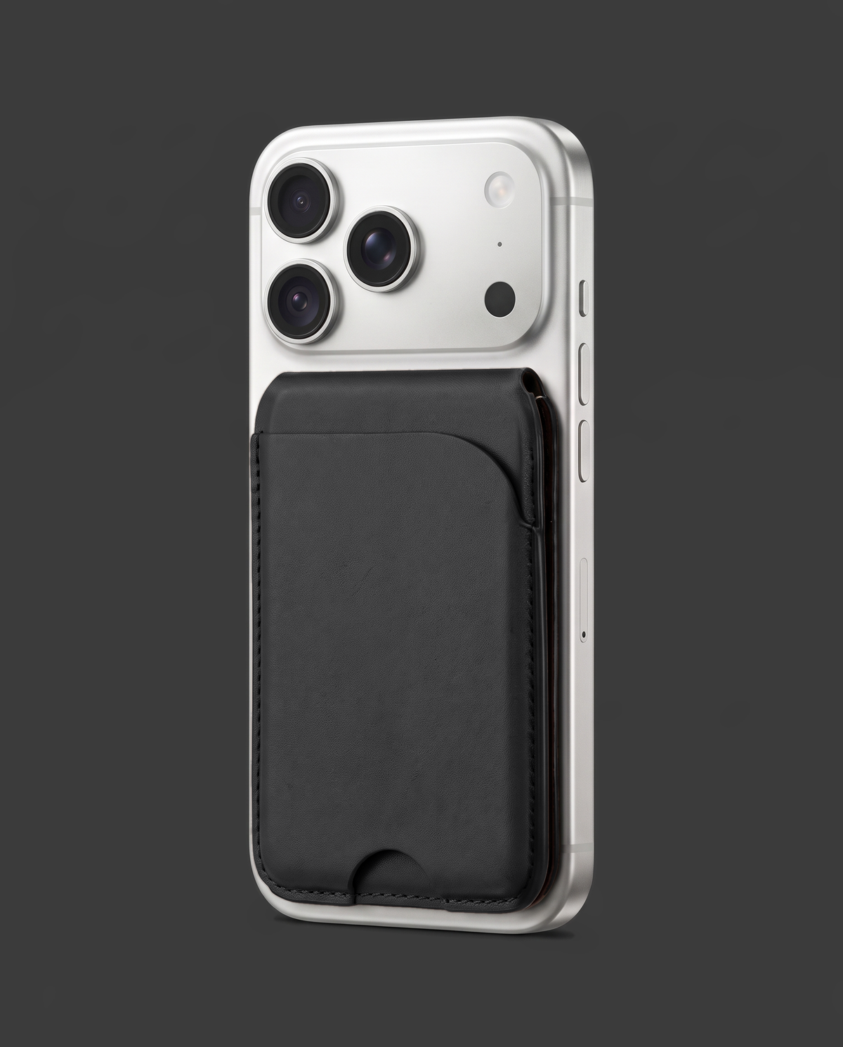 Black card wallet on an iPhone, angled view